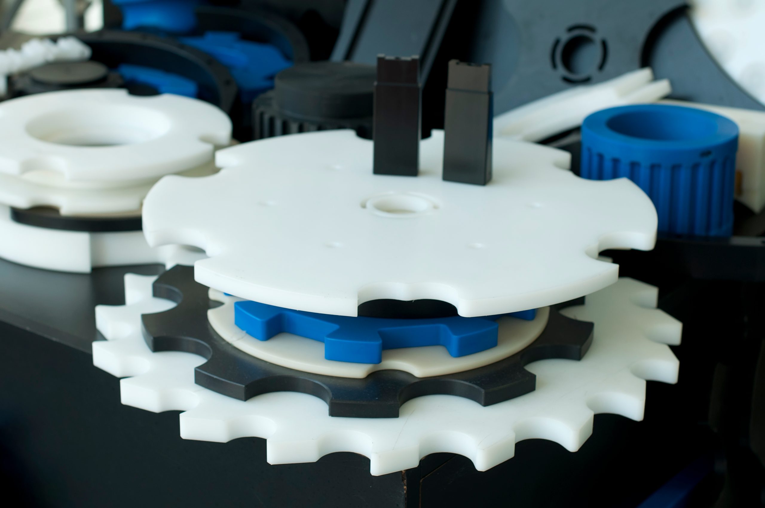 Plastic machine parts. Vertical imagel